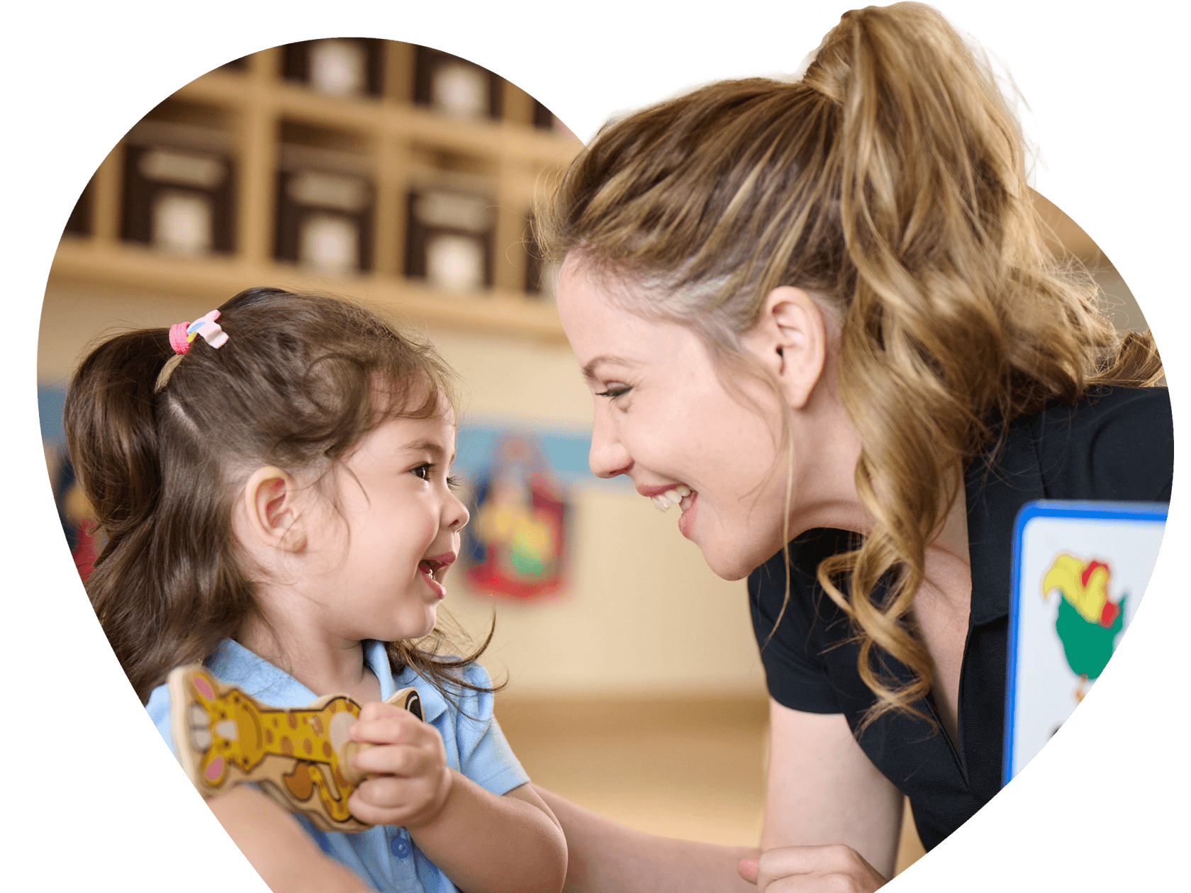 Primrose educator helping a child with an activity